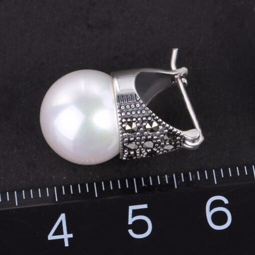 boucles d'oreilles argent vieilli et perle (taille)