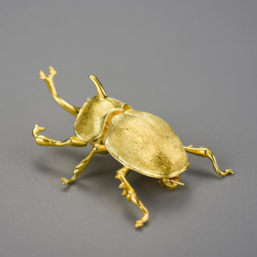 Broche scarabé doré
